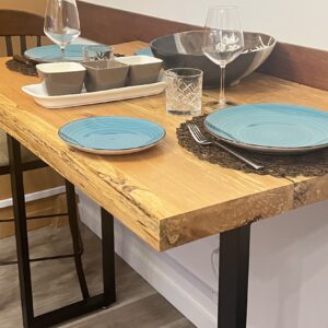 CC-01-15 - Club Car artisanal Spalding maple high-top table, perfect for a romantic night in with a view of the PNW inspired living area