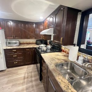 CC-02-10 - Club Car features a fully equipped kitchen with ample counter space and full-sized appliances, perfect for preparing shared meals during a group stay