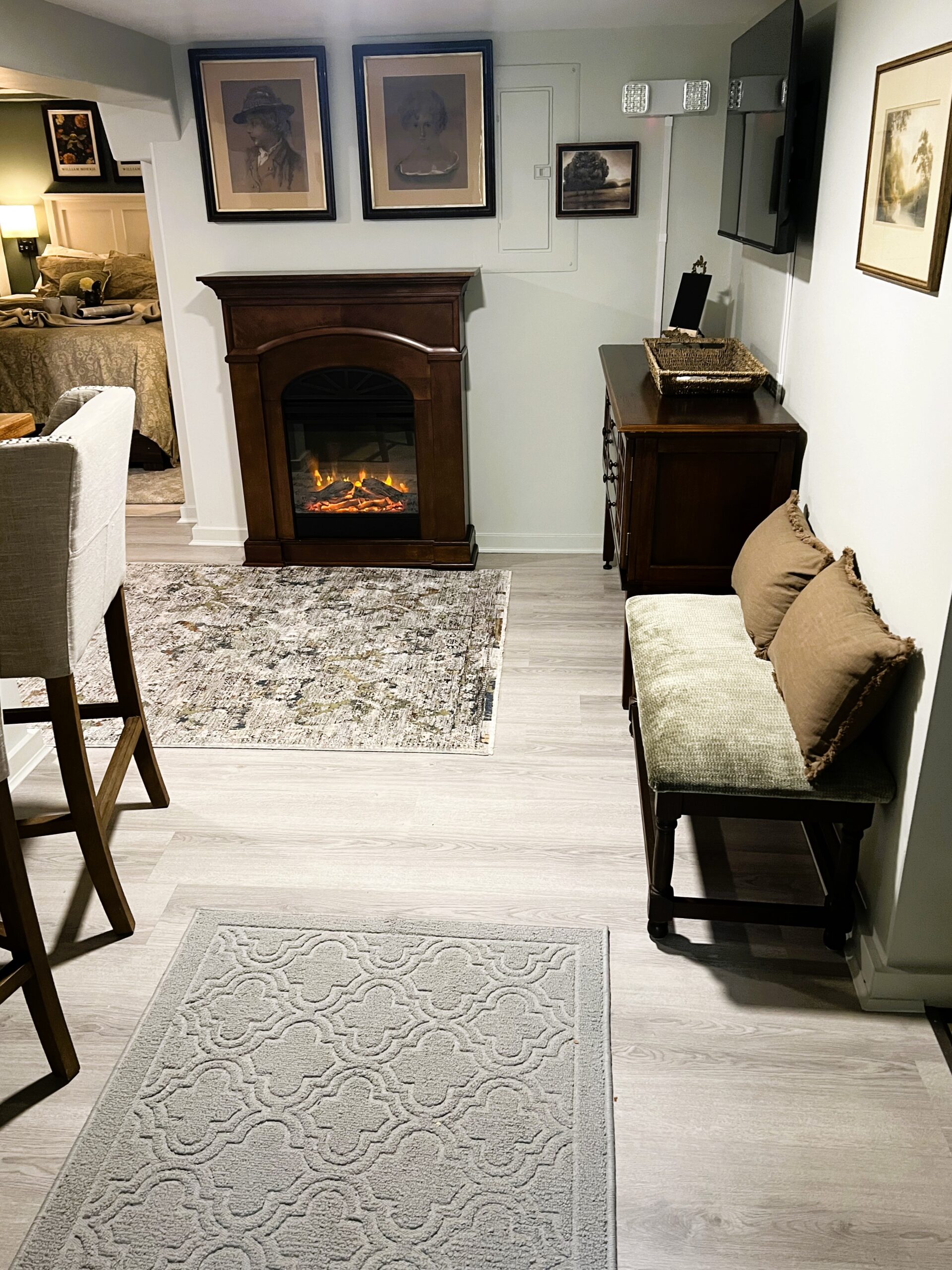 GS-03-09 - Garden Suite cozy living area featuring fireplace and inviting entry seating