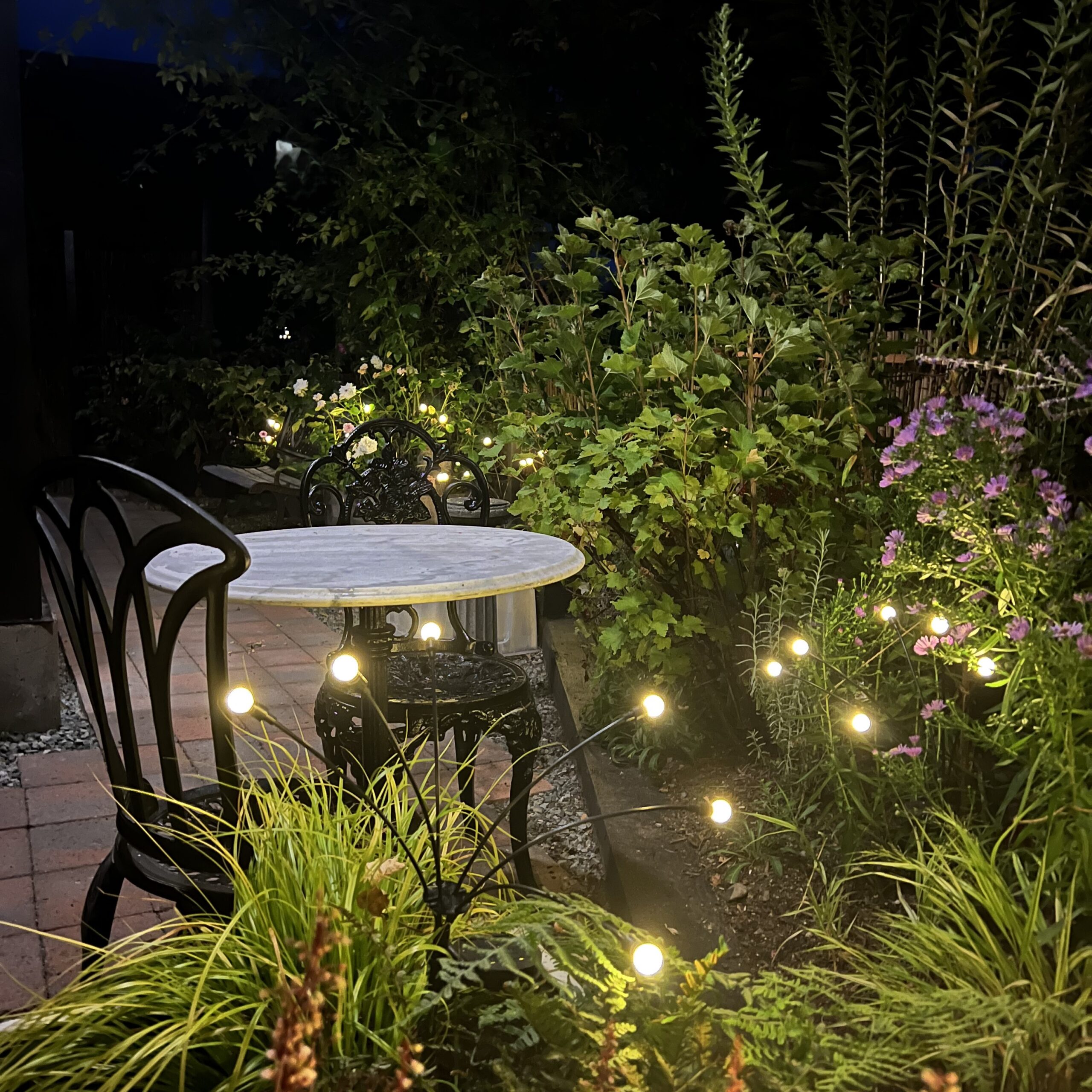GS-03-06 - Garden Suite enchanting evening patio atmosphere with firefly lights
