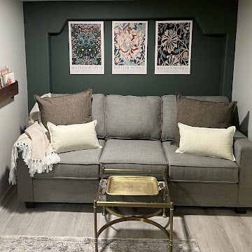 GS-03-11 - Garden Suite comfy sofa and reading nook featuring salvaged church pew book holders